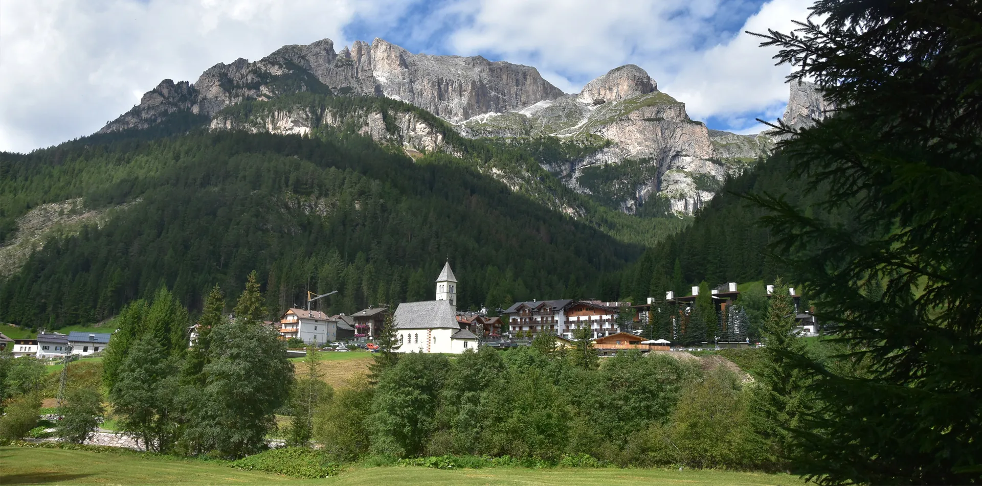 Mazzin di Fassa in the valley beneath the Dolomite peaks